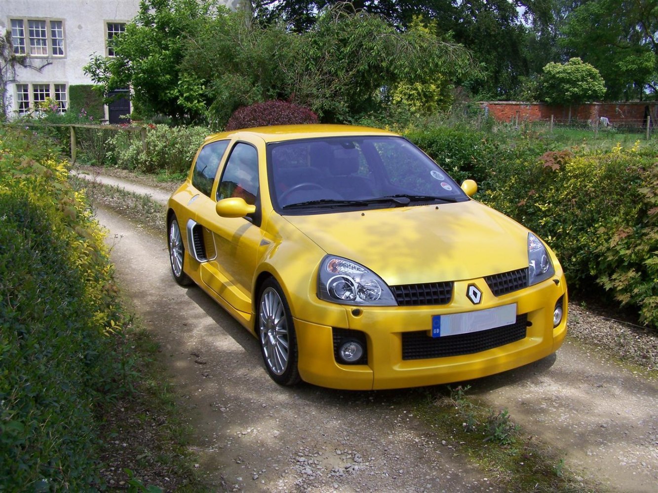Yellow hatchback with sporty front and side air vents