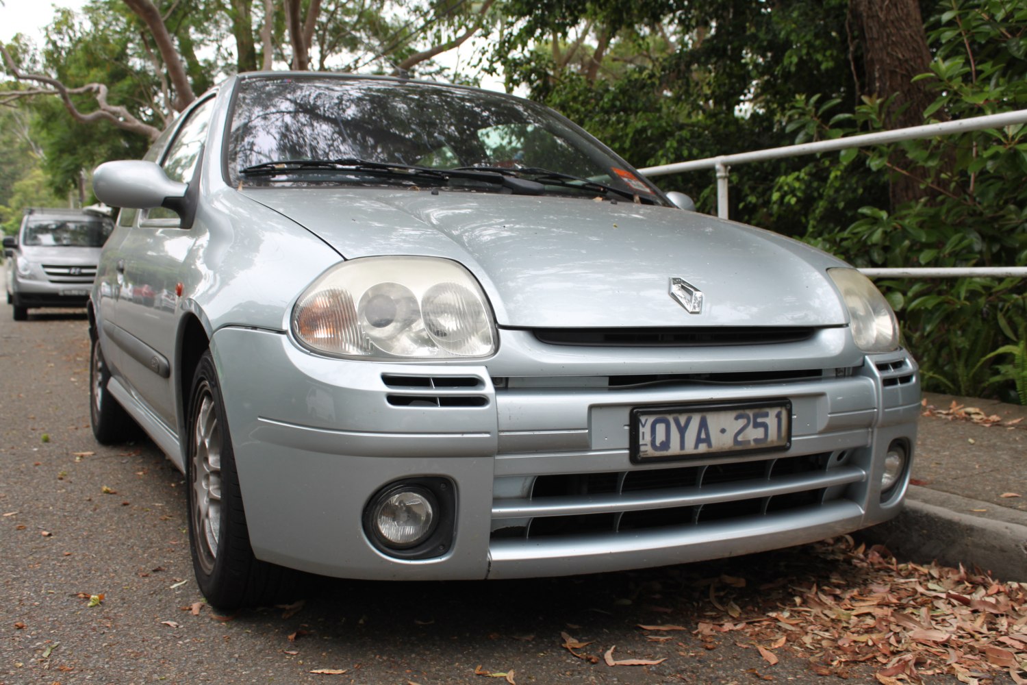 Front close-up with headlights and grille of a 3-door hatchback