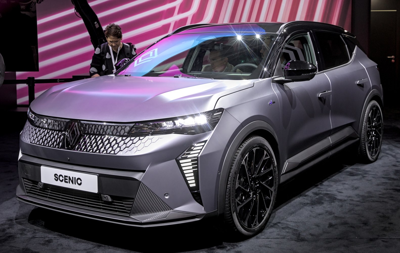 Front view of car with LED headlights and hexagonal grille