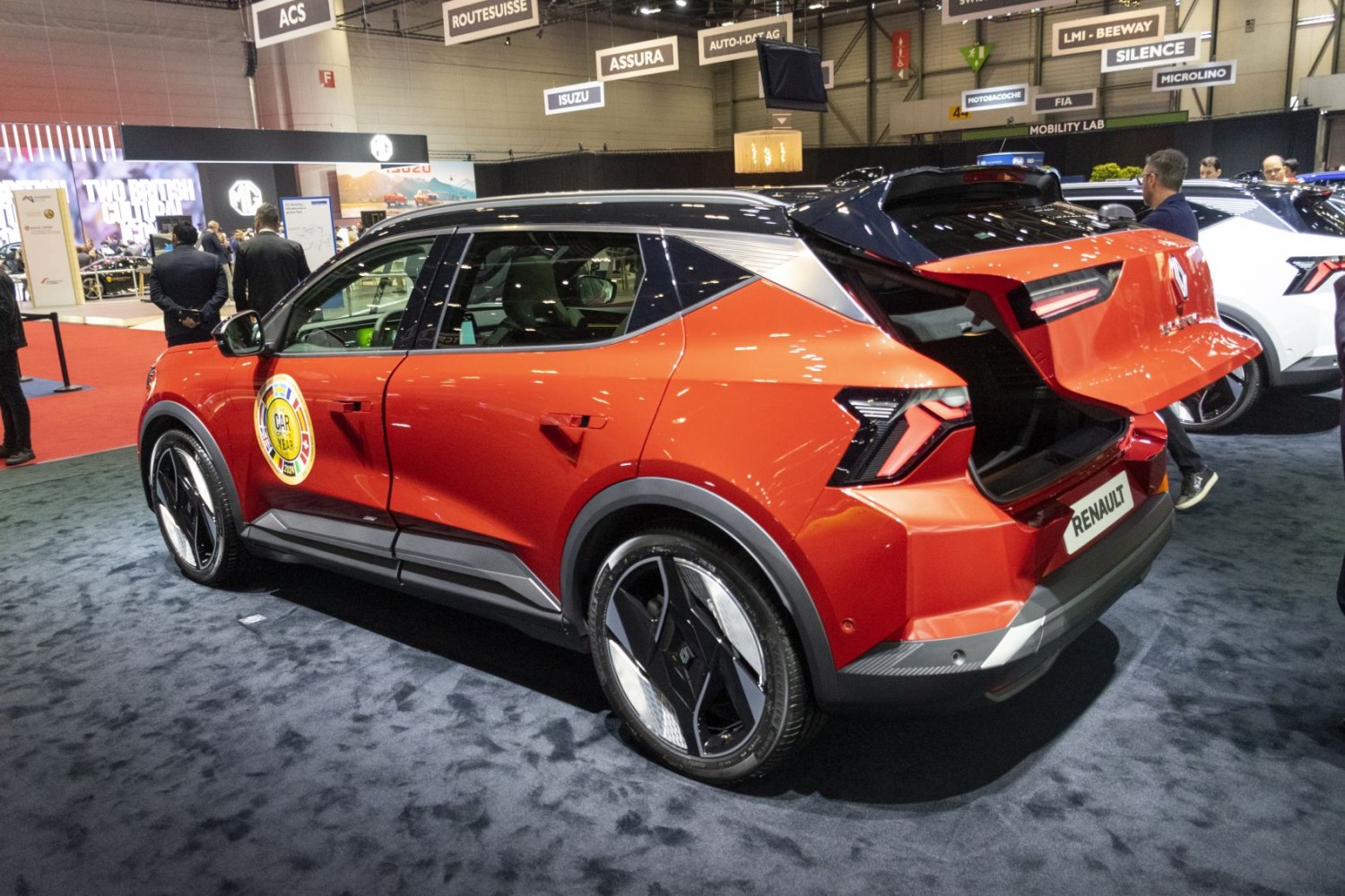 Rear and side view of electric SUV with open hatchback tailgate