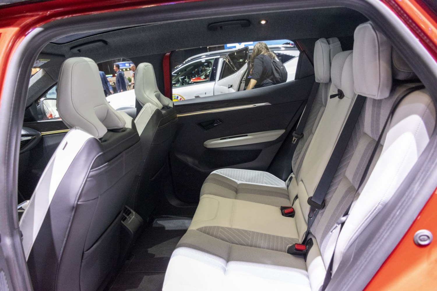 Spacious rear seat interior with modern upholstery and seat belts