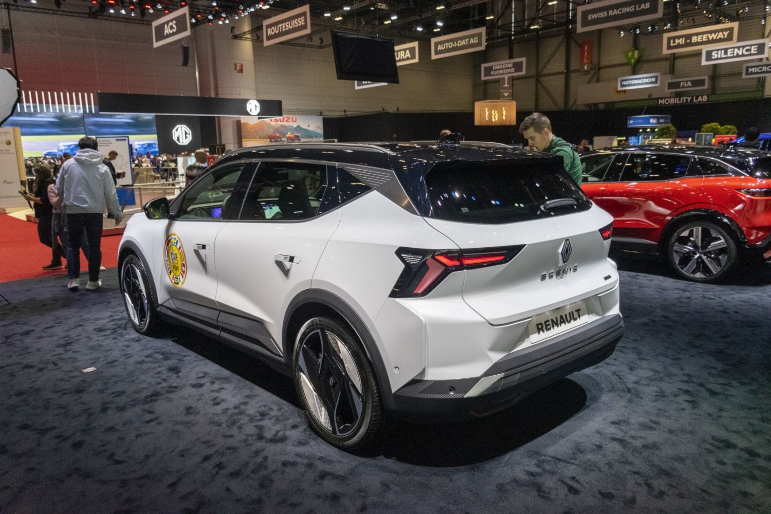Rear and side view of modern electric vehicle with distinct taillights and aerodynamic shape