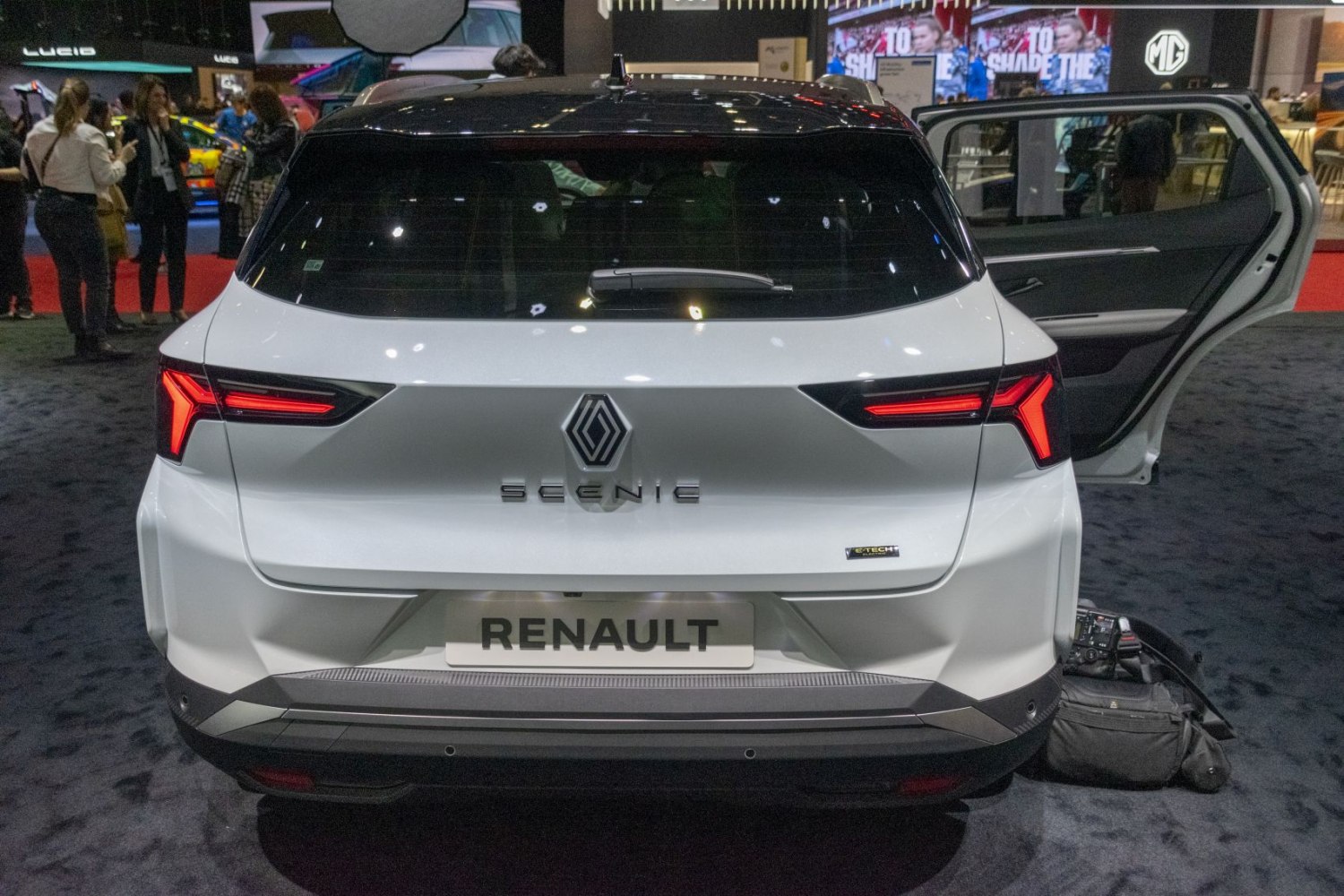 Rear view with LED tail lights and two-tone roof design.