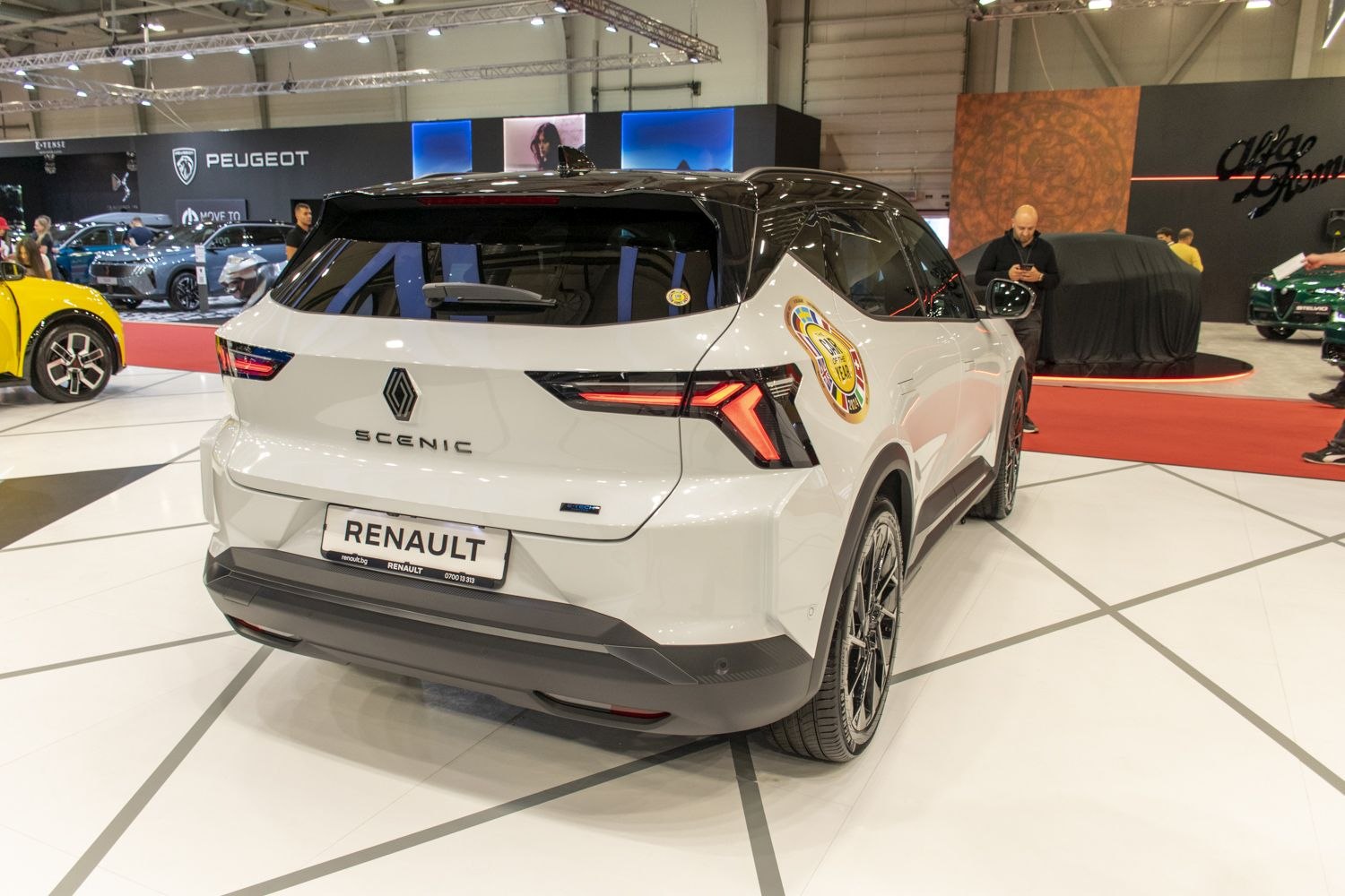 Rear view with modern taillights and sleek hatchback design
