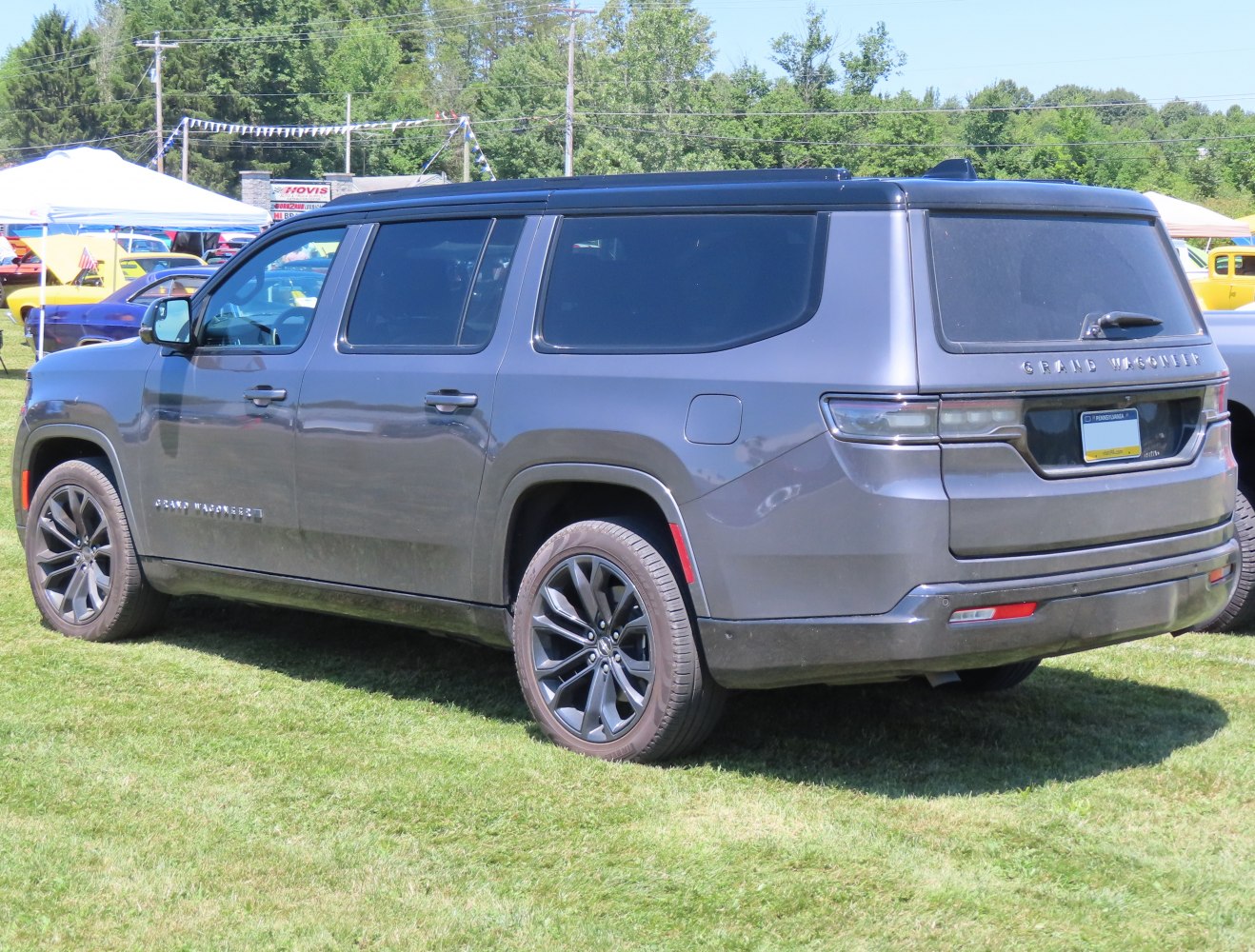 Rear side profile with tinted windows and sleek taillights
