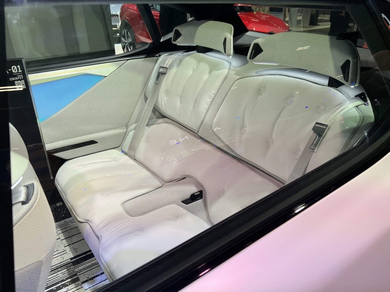 Innovative rear seats with integrated headrests in modern interior.