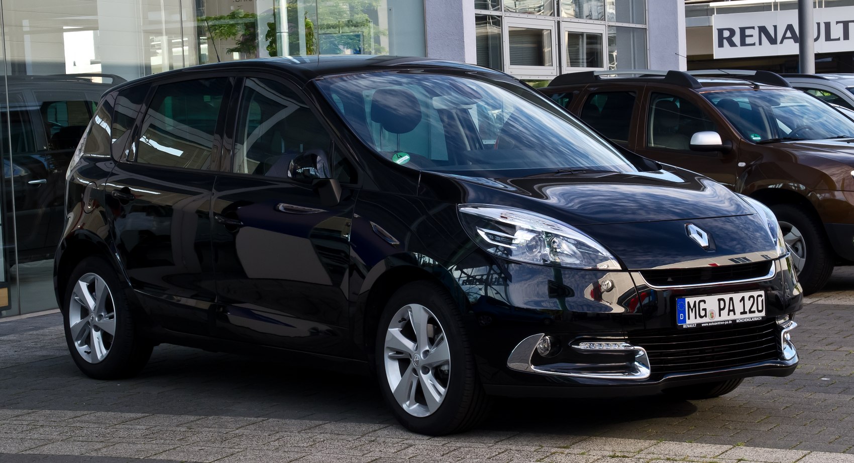Sleek front grille and modern headlights of compact multi-purpose vehicle