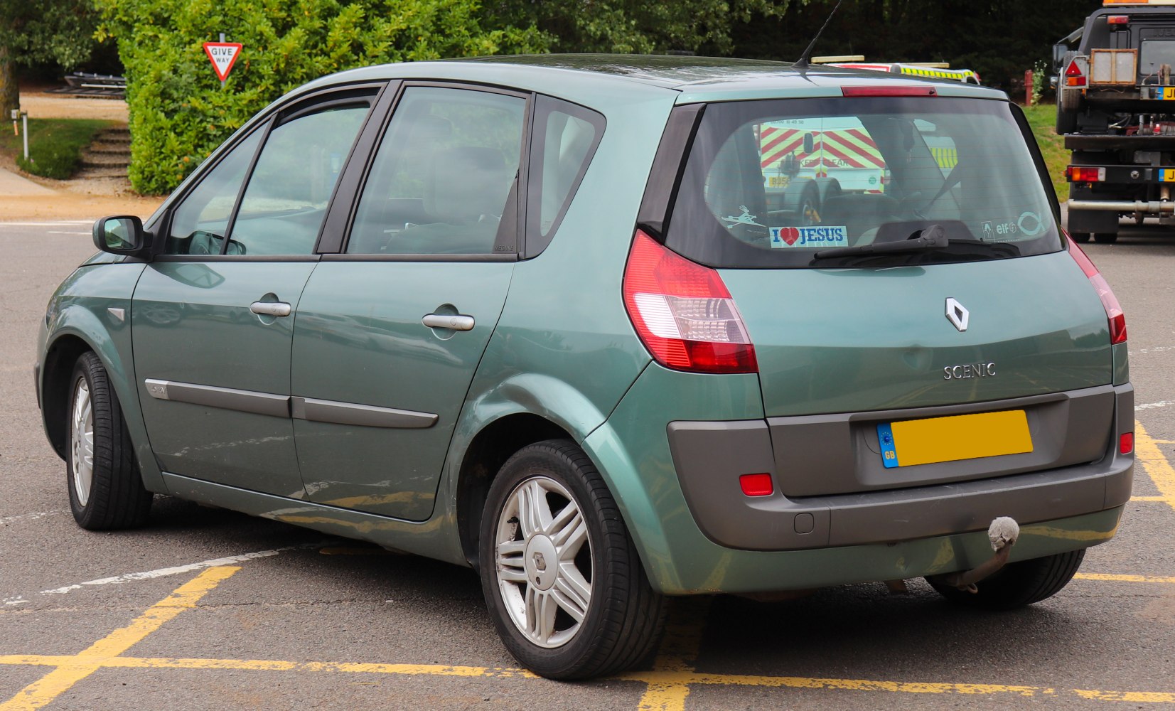 Rear and side view of compact MPV with distinctive tail lights and alloy wheels