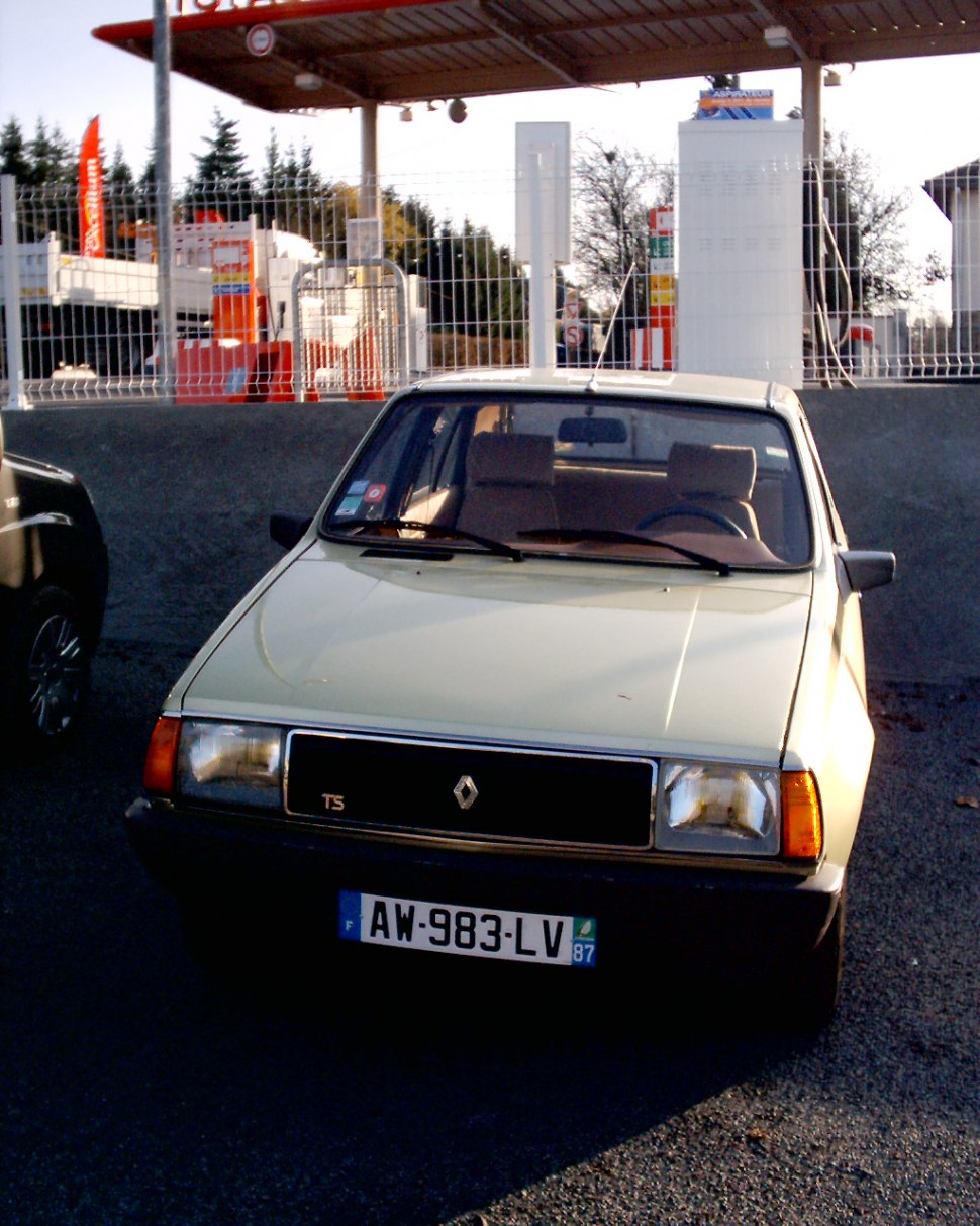 Compact hatchback front with square headlights and distinctive grille