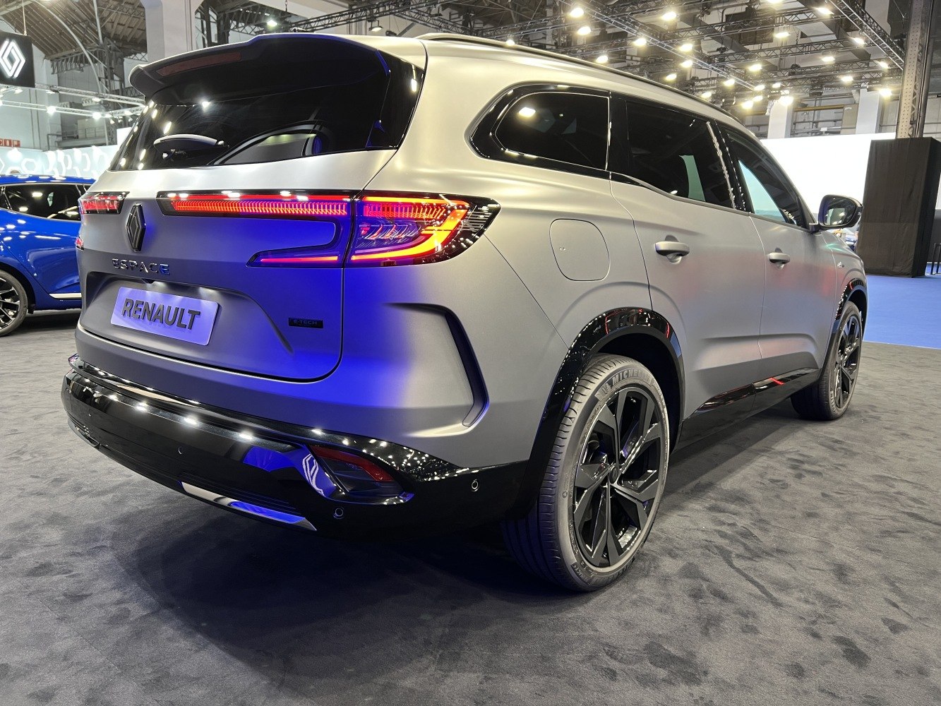 Modern SUV rear profile with illuminated LED tail lights.