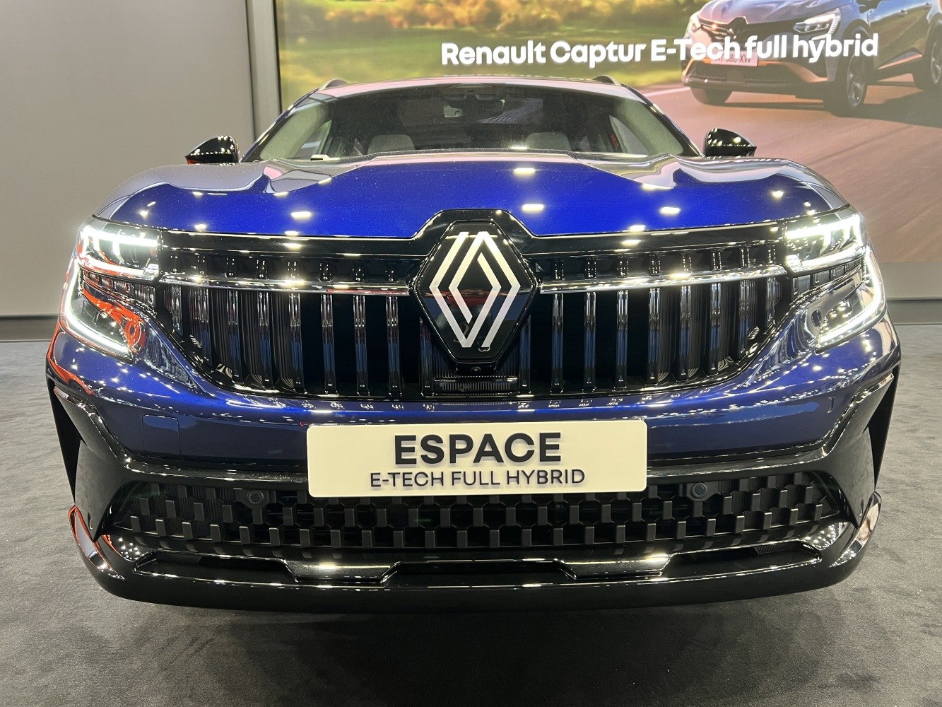 Front grille with LED headlights and badge