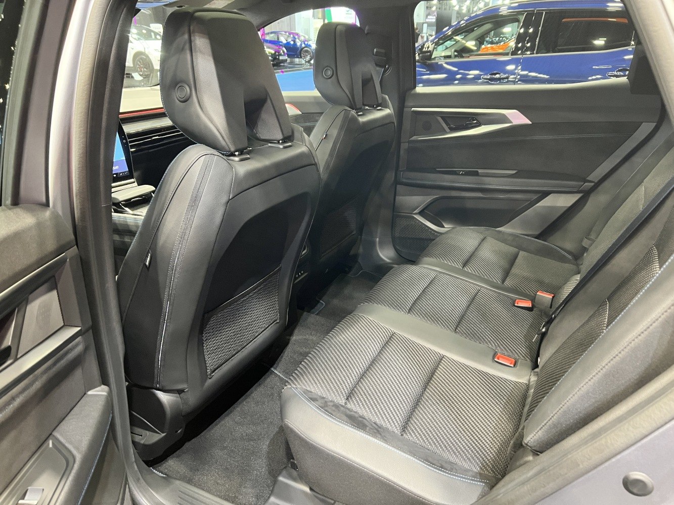 Rear seating area with black upholstery and modern design