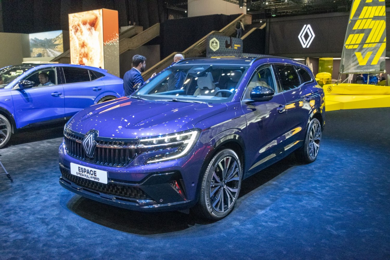 Front view of modern hybrid SUV with LED headlights and sleek grille
