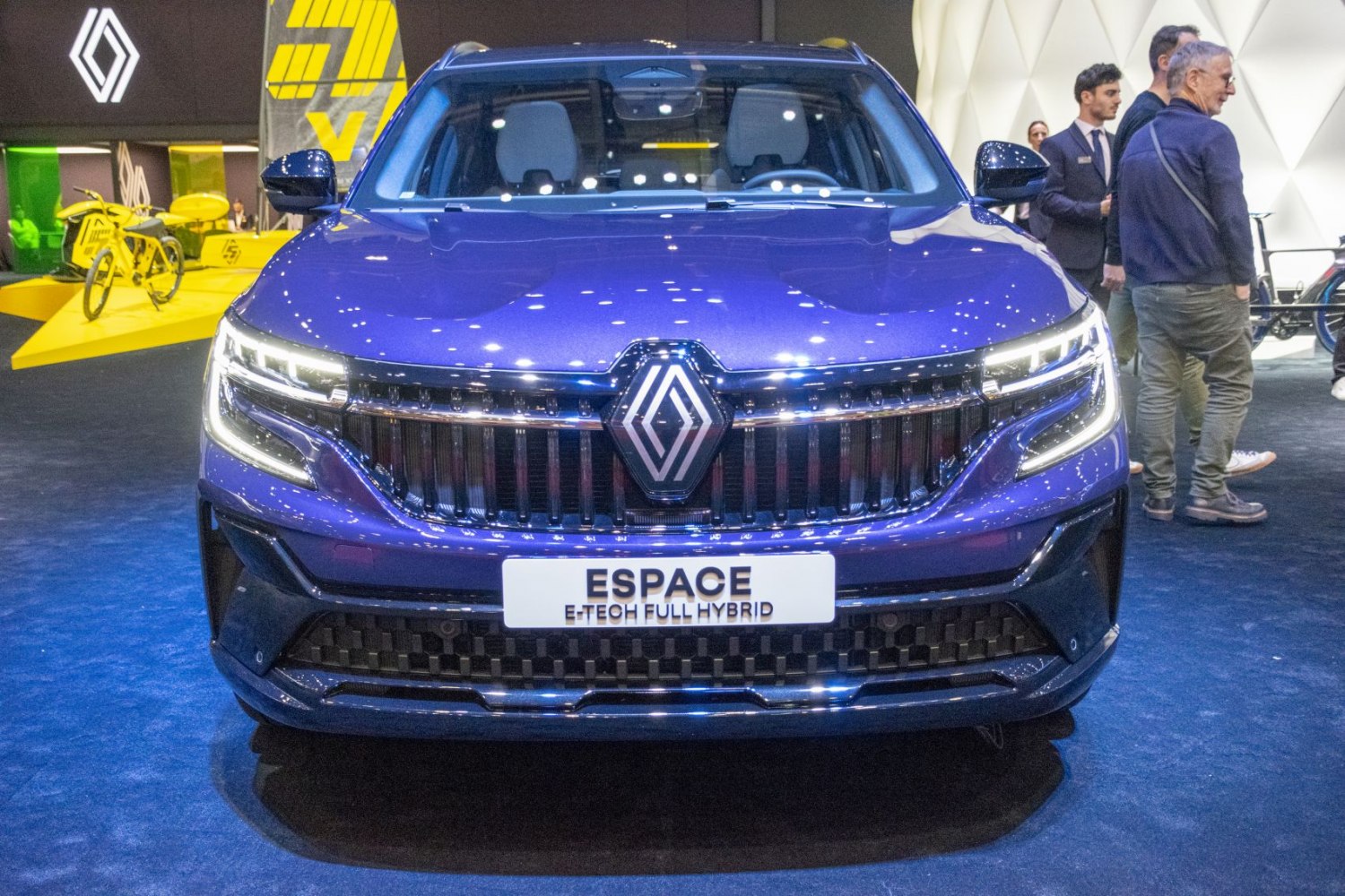 Front view with grille, LED headlights, and hybrid badge