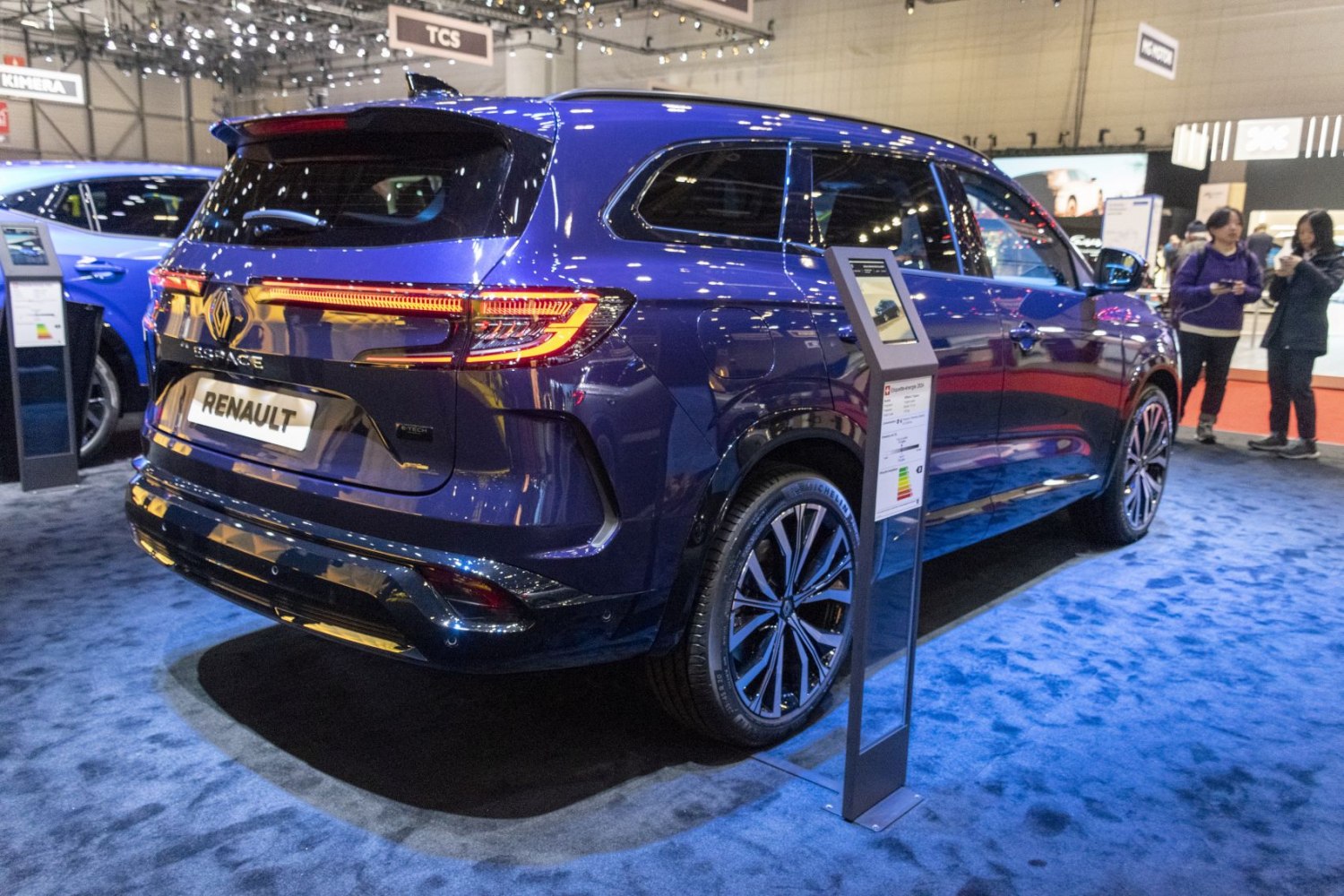 Rear view with modern taillights and sleek blue paint