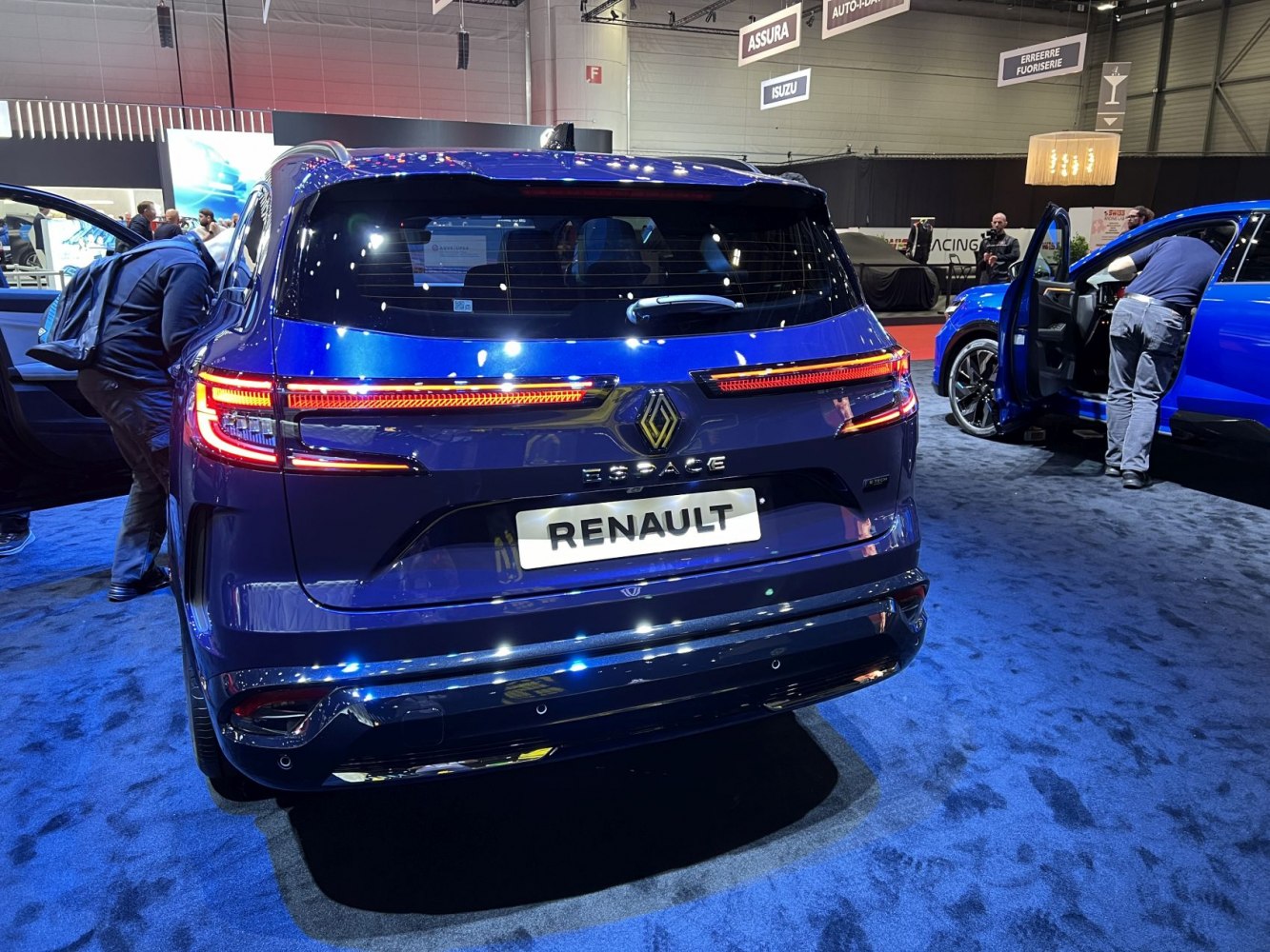 Rear view of vehicle with LED strip tail lights and distinct rear hatch design