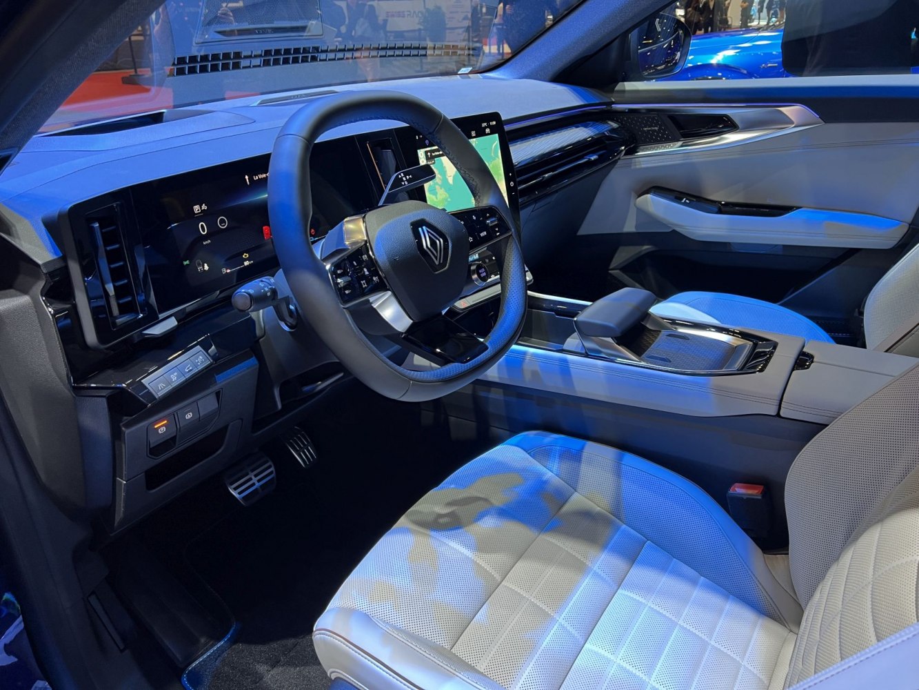 Modern digital cockpit with touchscreen and luxury leather seats
