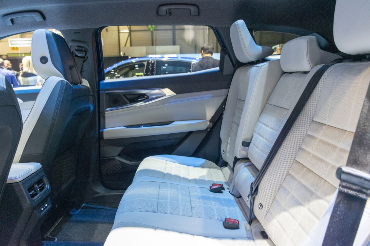 Rear passenger seating with modern, premium upholstery and door panel