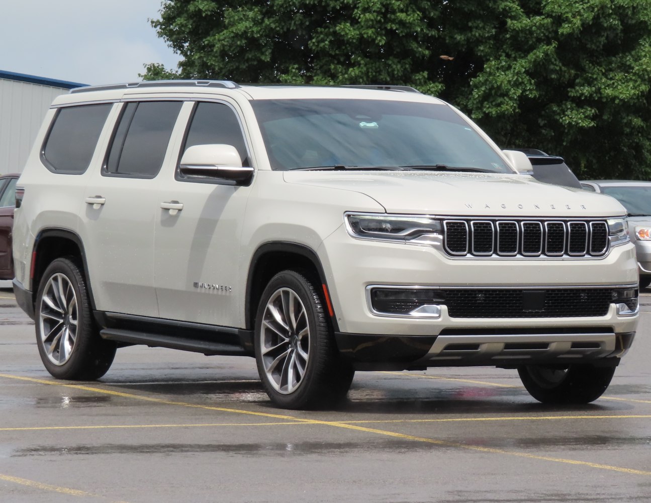 Modern SUV front side with signature grill and sleek headlights.