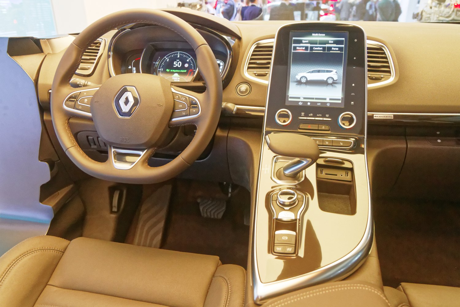 Digital instrument cluster and touchscreen center console with multifunction steering wheel