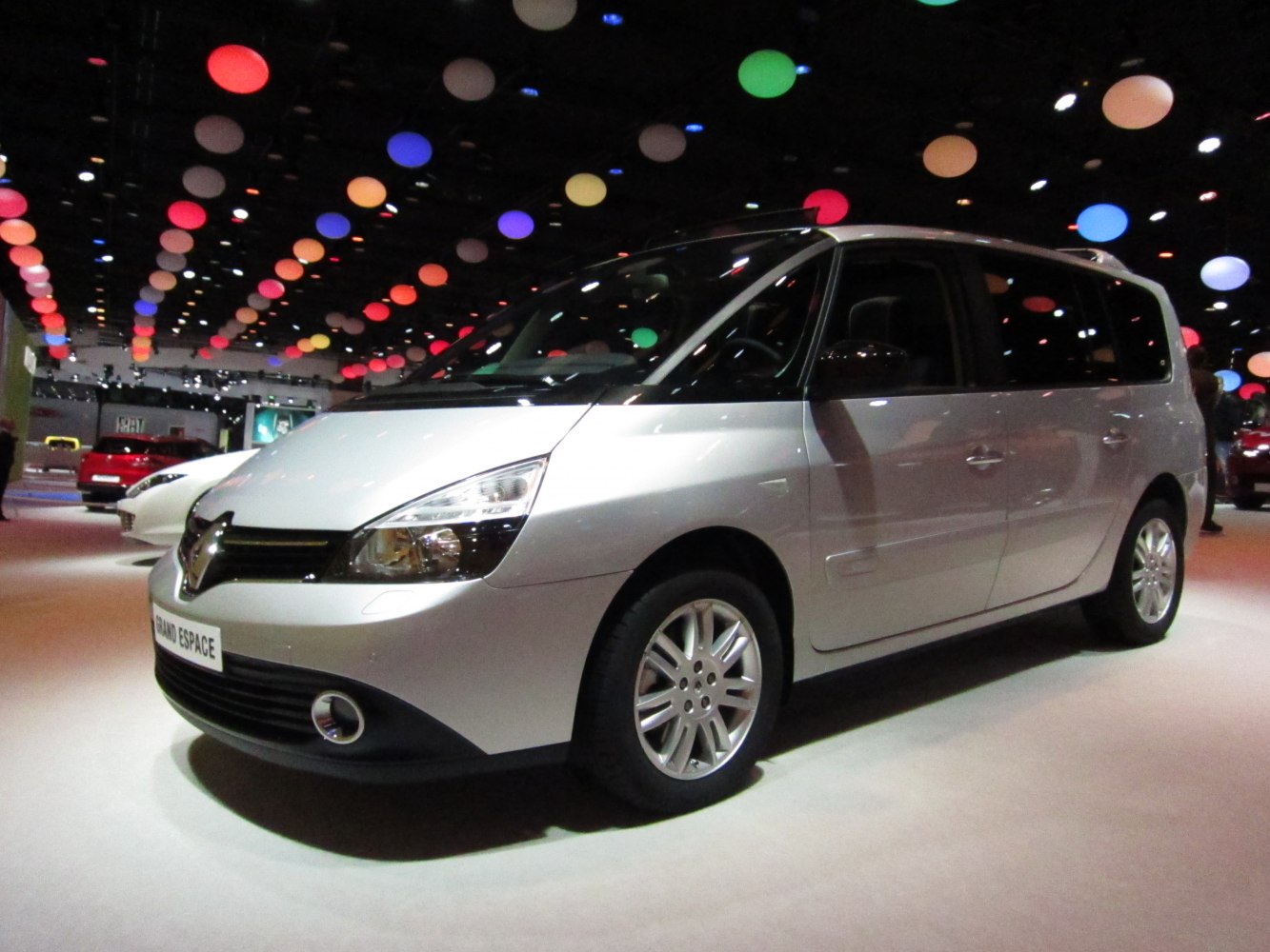 Silver large MPV front-side angle with alloy wheels and clear headlights