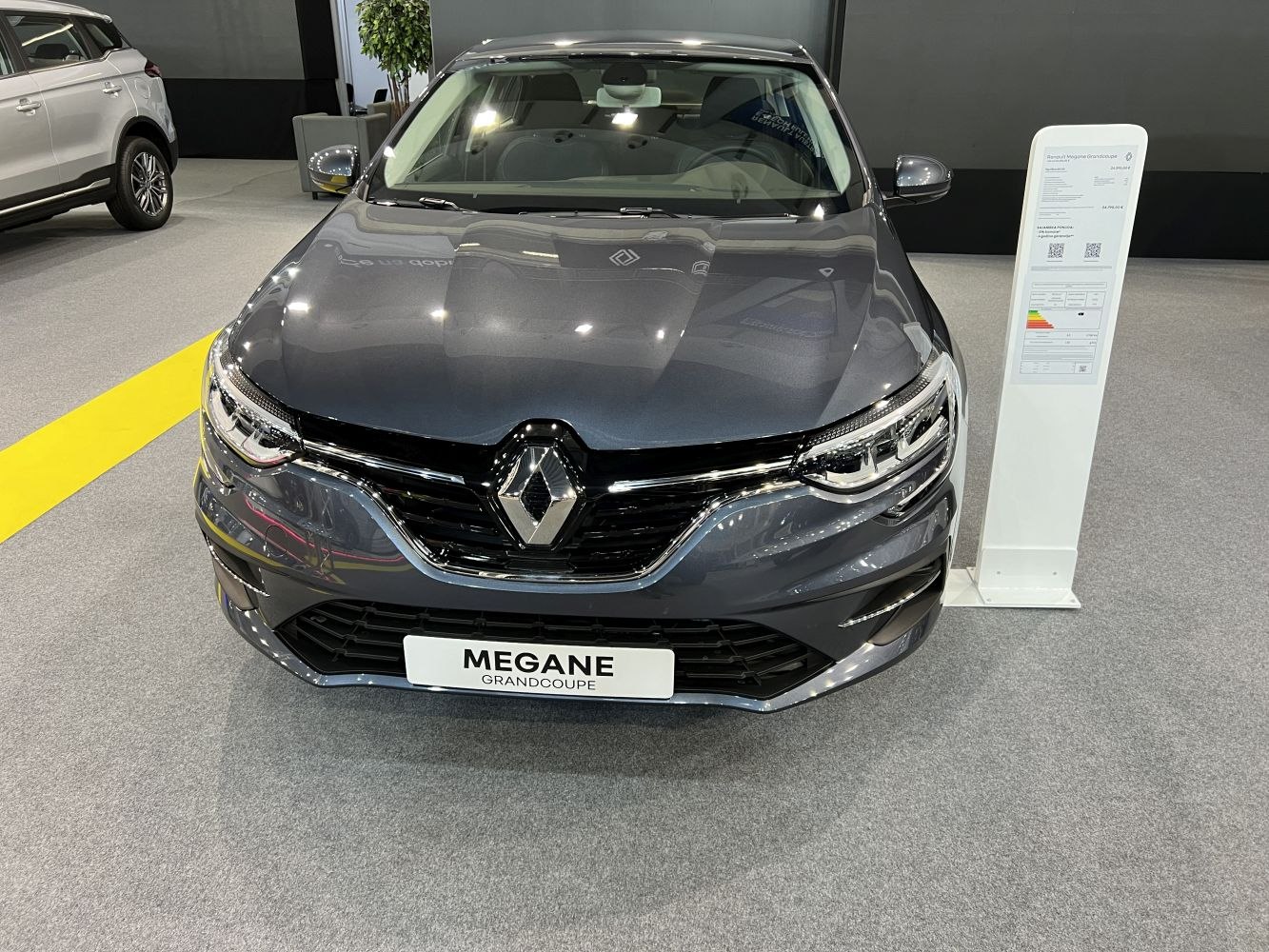 Front grille and LED headlights of a modern sedan