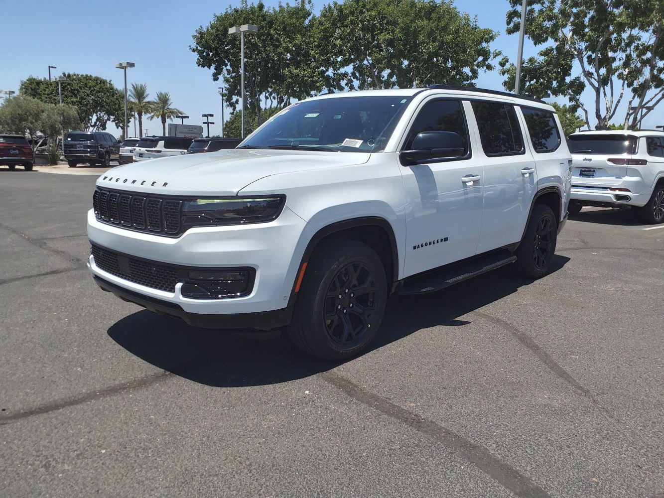 Bold front grille and sleek LED headlights of a large SUV