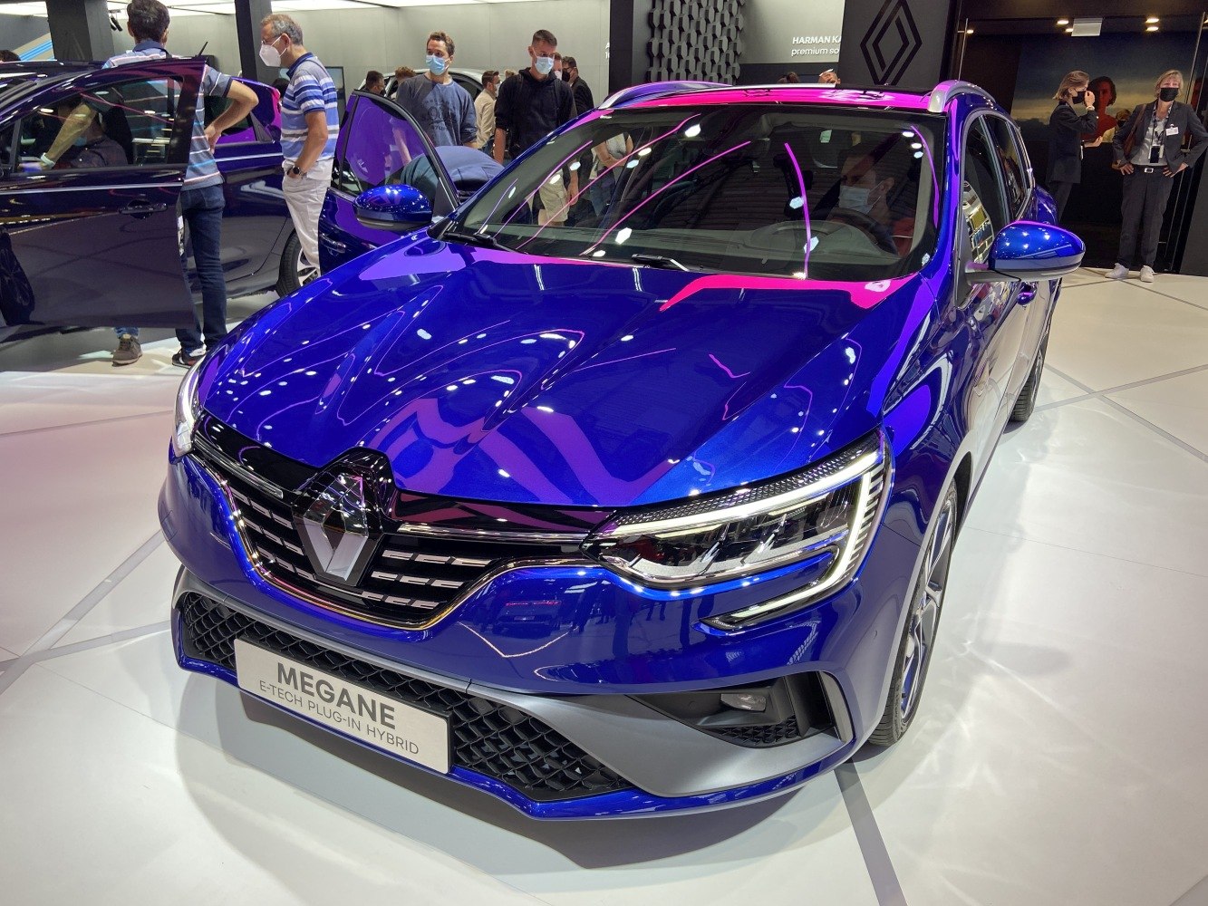 Front view of a modern hybrid station wagon with LED headlights