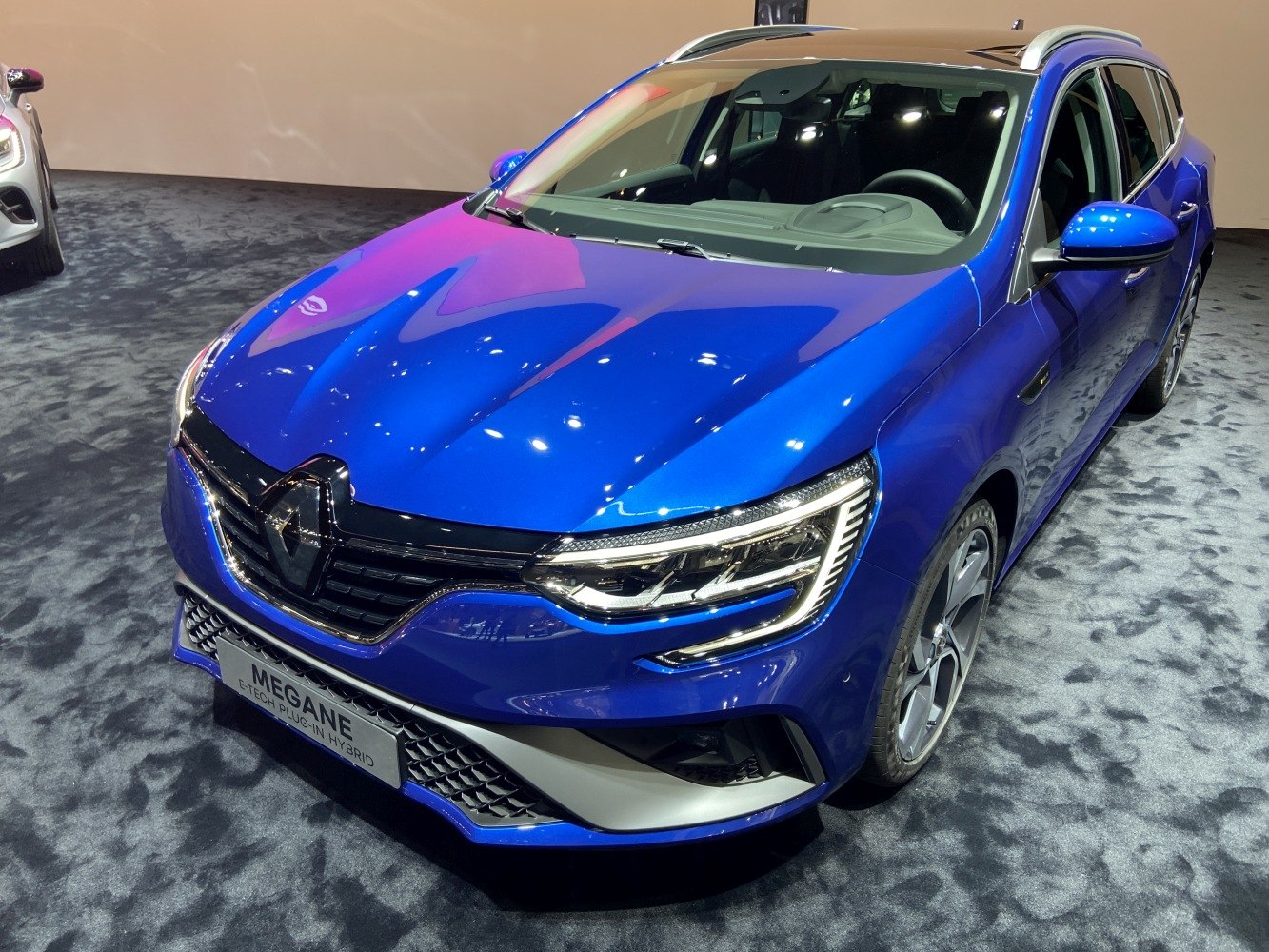 Close-up of front view focusing on headlight and grille design