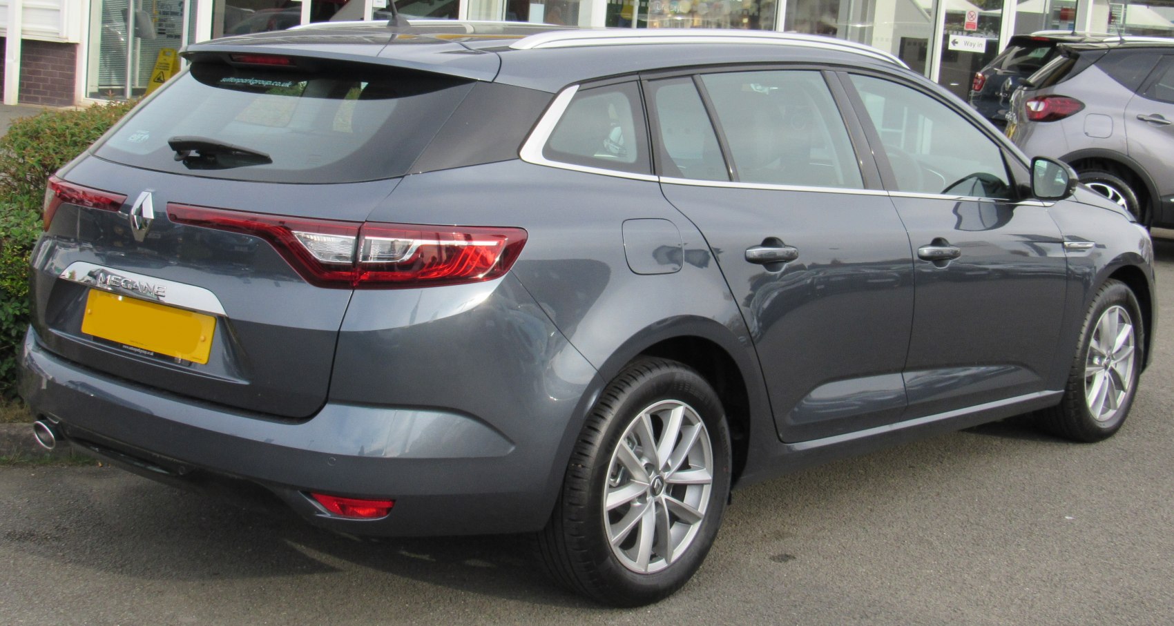Estate-style rear with LED tail lights and chrome trim