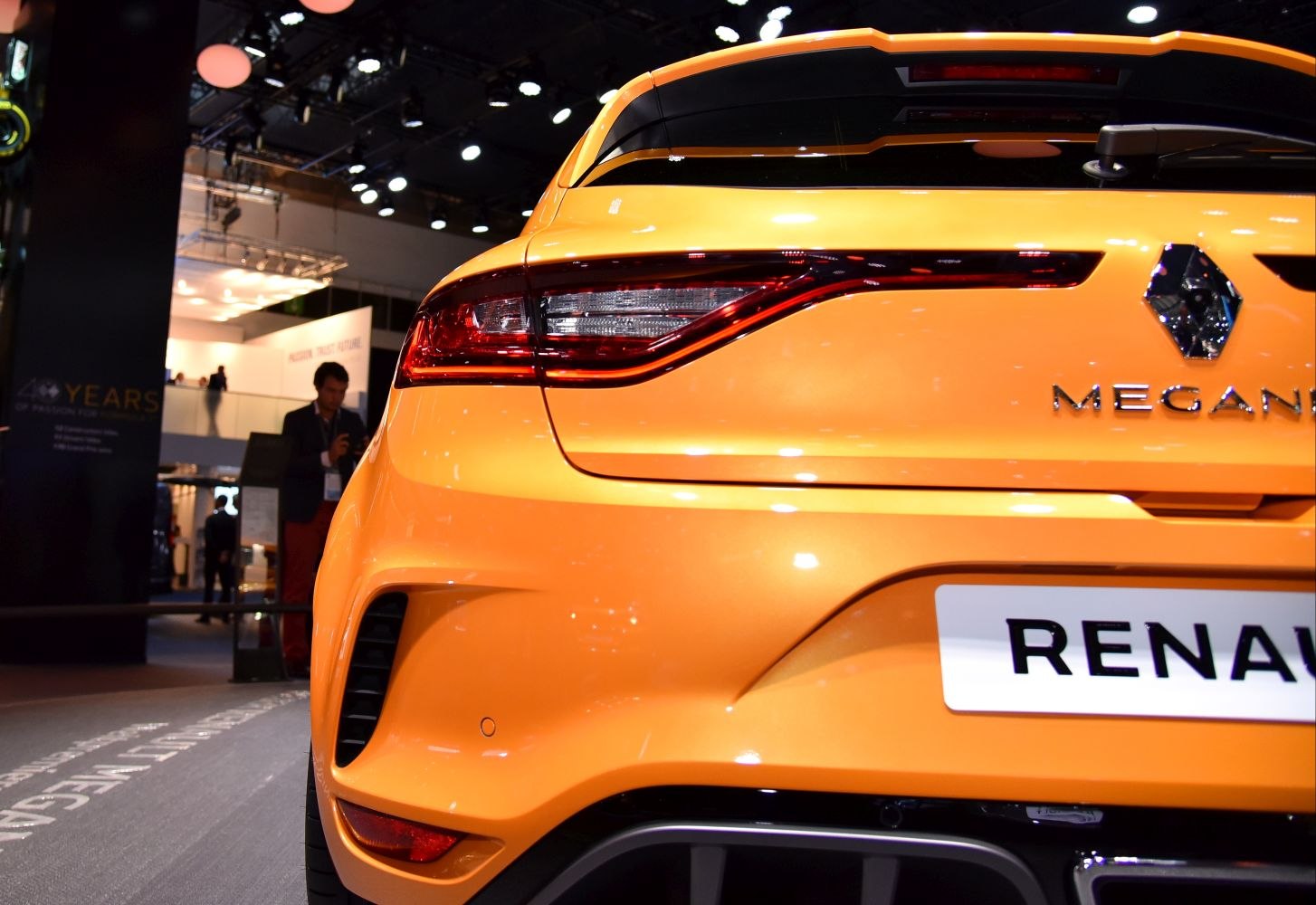 Rear view with LED tail lights and sporty bumper in bright orange