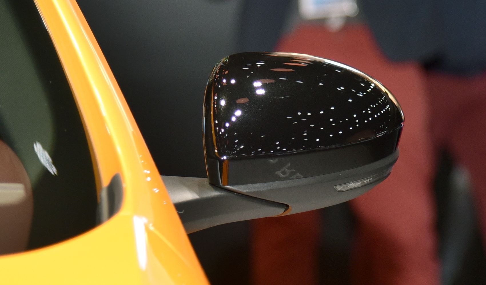 Black side mirror with integrated turn signal