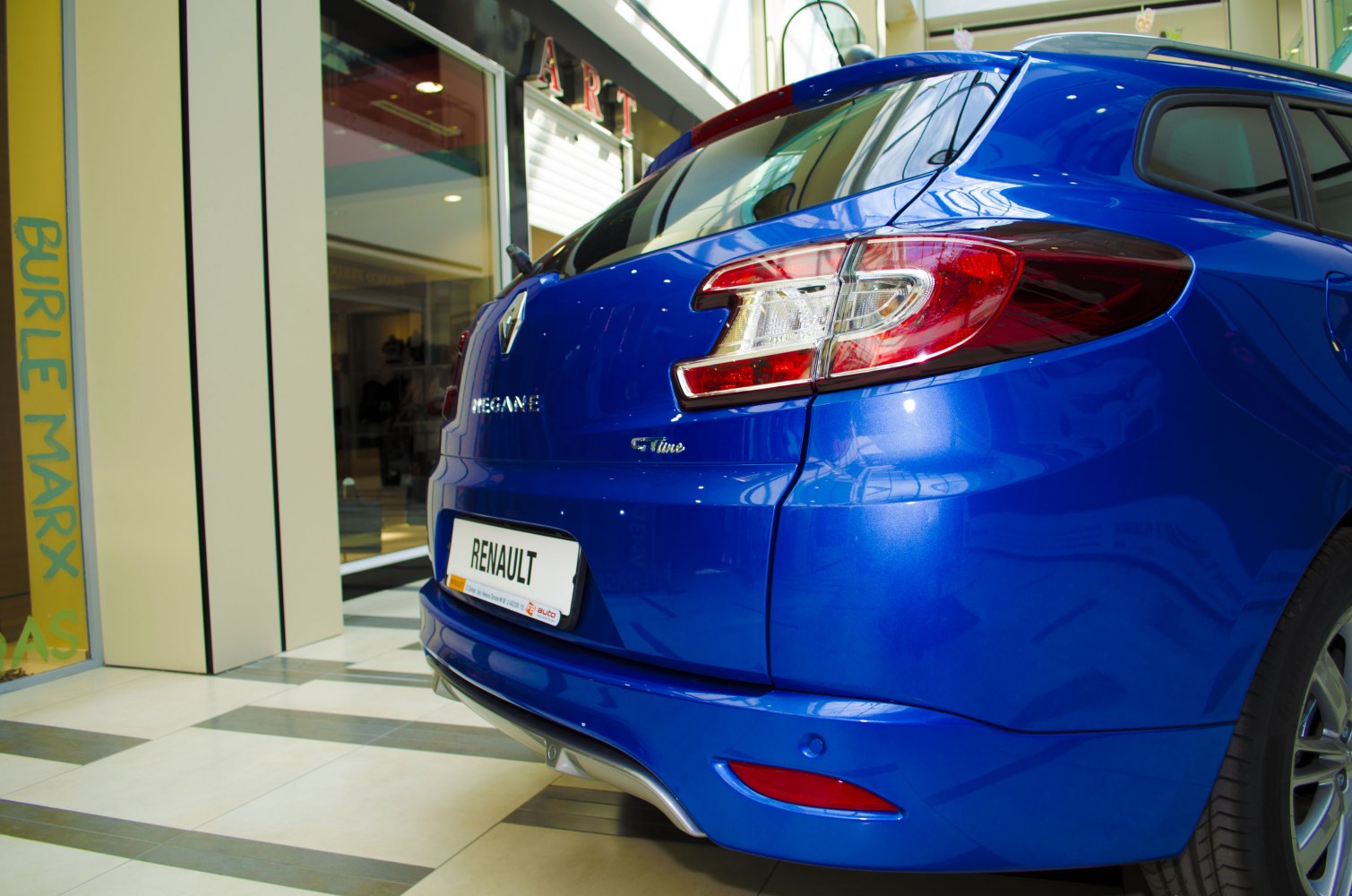 Sporty rear design with distinctive tail lights and sleek bumper