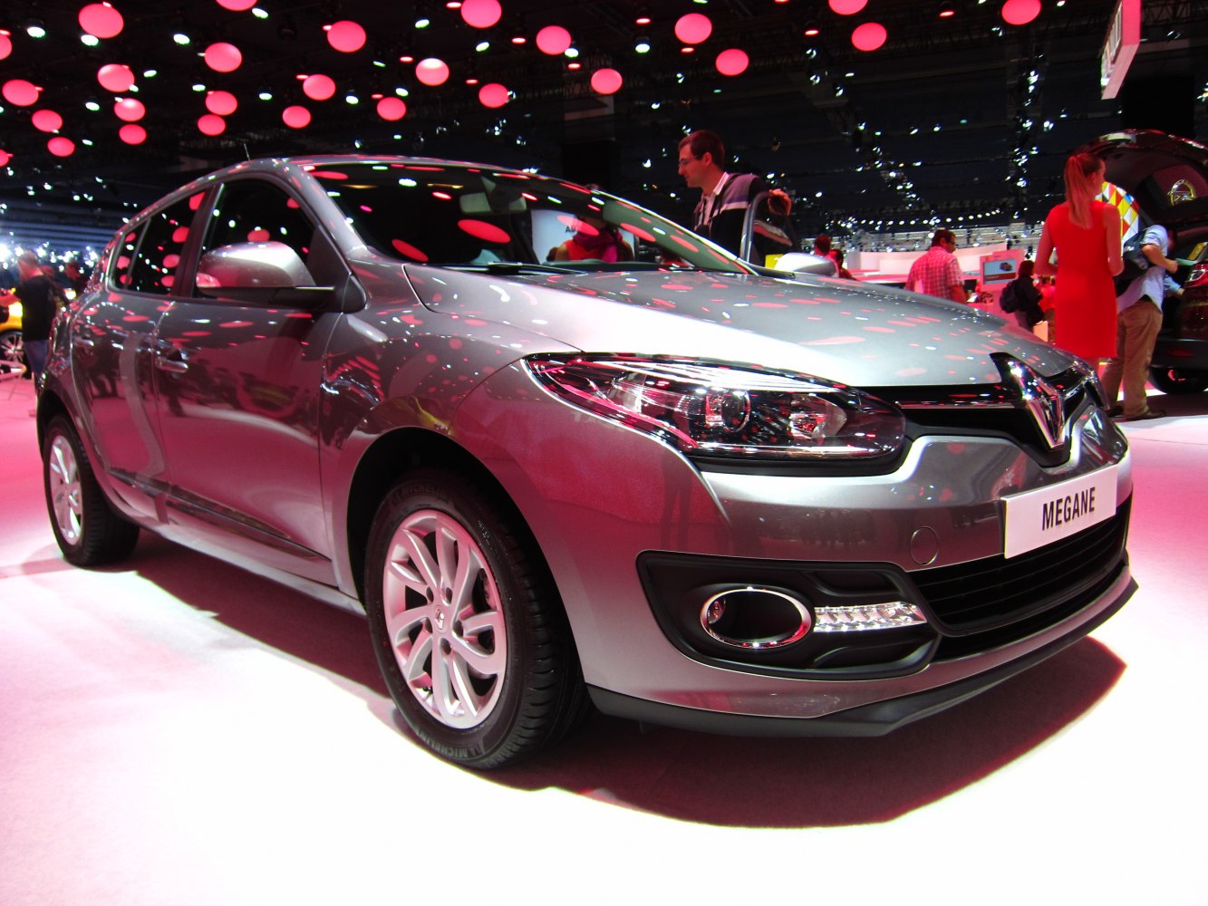 Front view with detailed headlights and alloy wheels