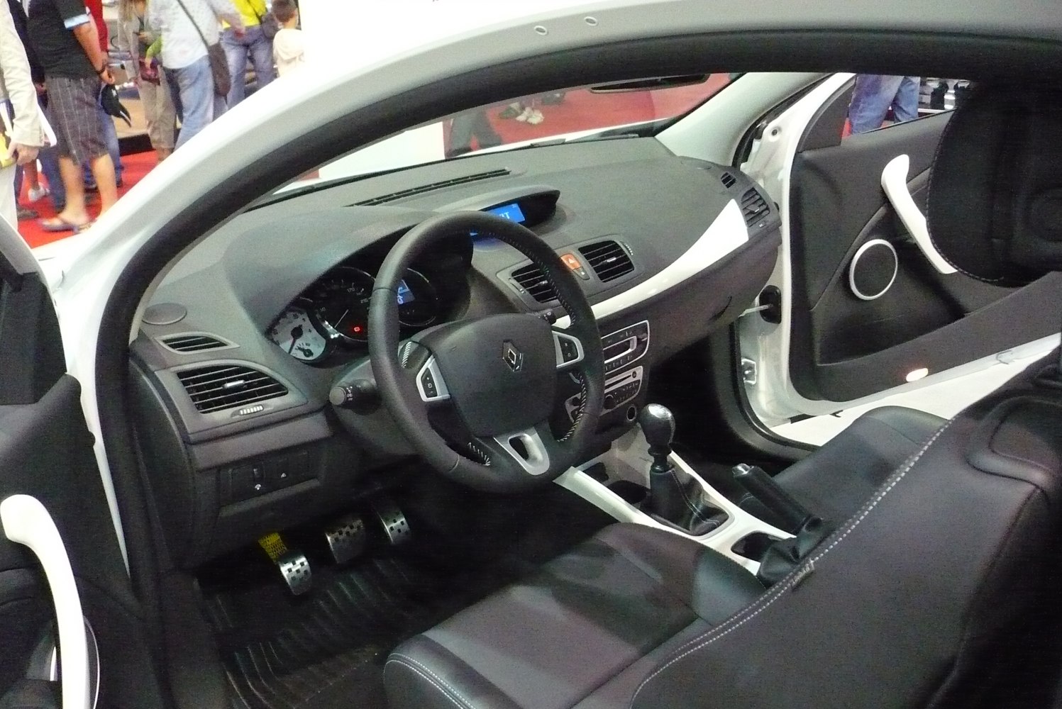 Sporty car interior with manual transmission and detailed dashboard