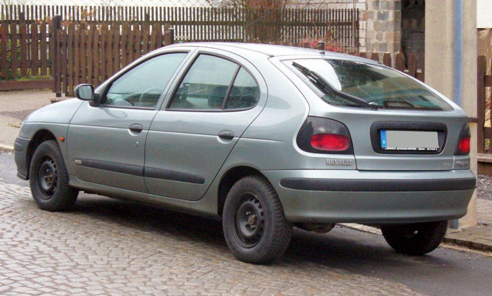 Side and rear view of a compact hatchback with rounded tail lights.