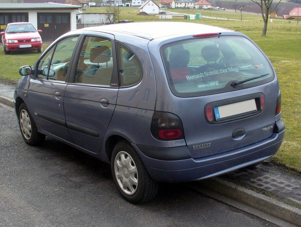 Rear and side view with distinctive taillights and multi-window rear design