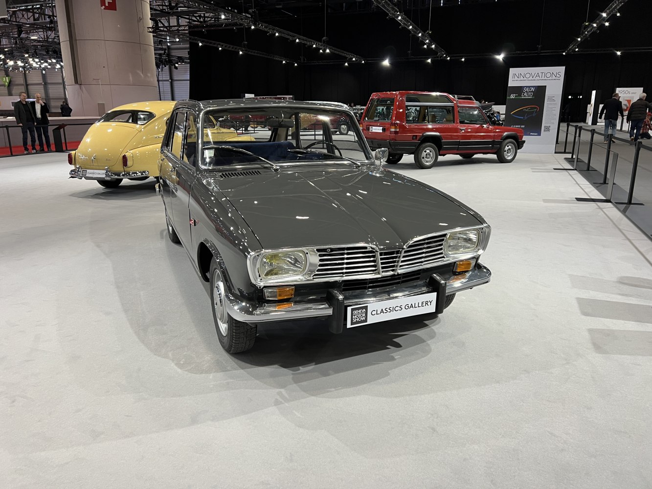 Vintage sedan with chrome grille and rectangular headlights