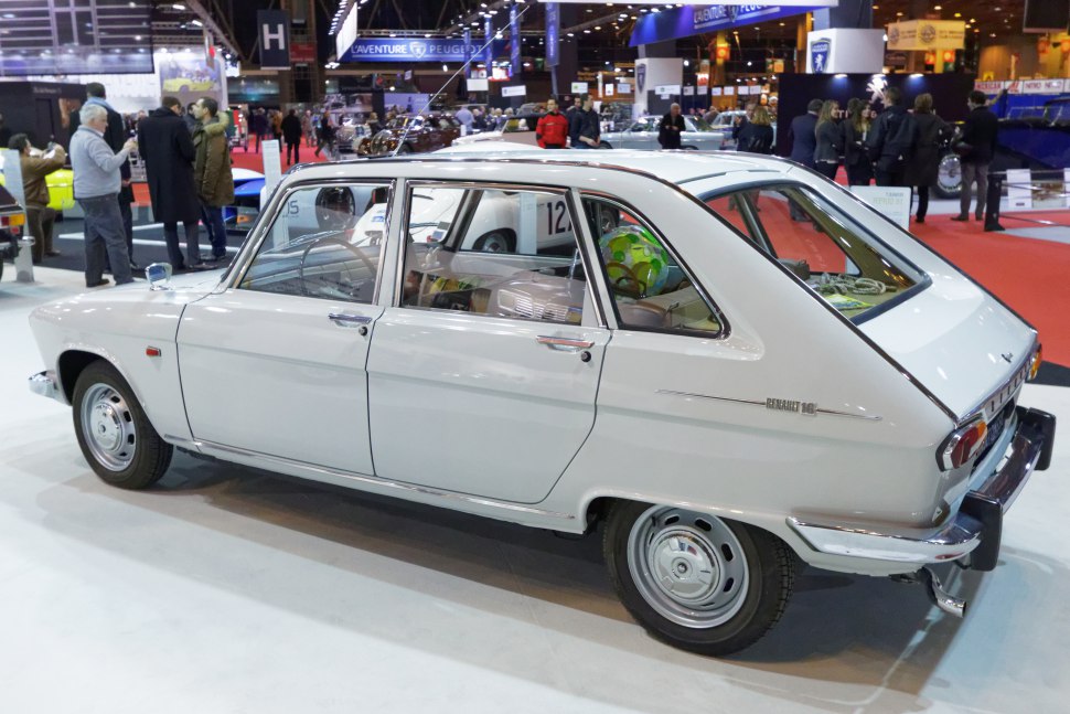 Classic white hatchback side profile with distinctive rear window and chrome details.