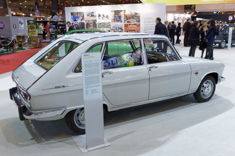 Side view of a classic 1960s hatchback with angular rear and vintage wheels