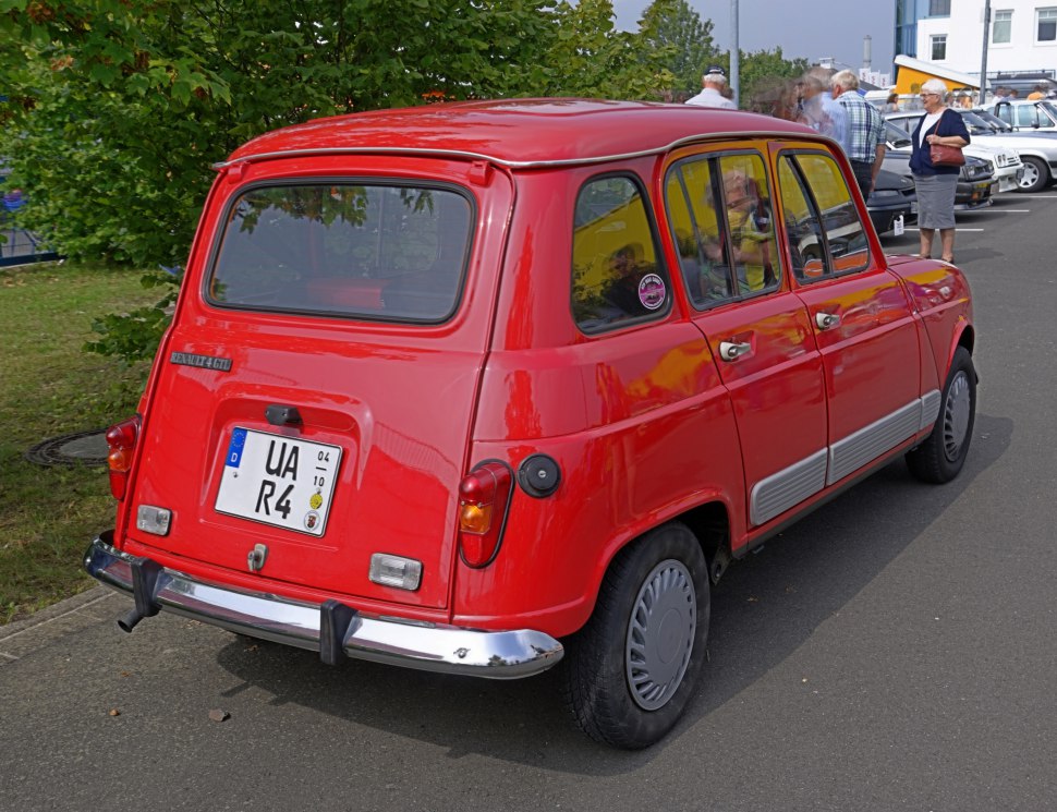 Rear-side of a vintage compact hatchback with chrome bumper and distinctive rear lights.