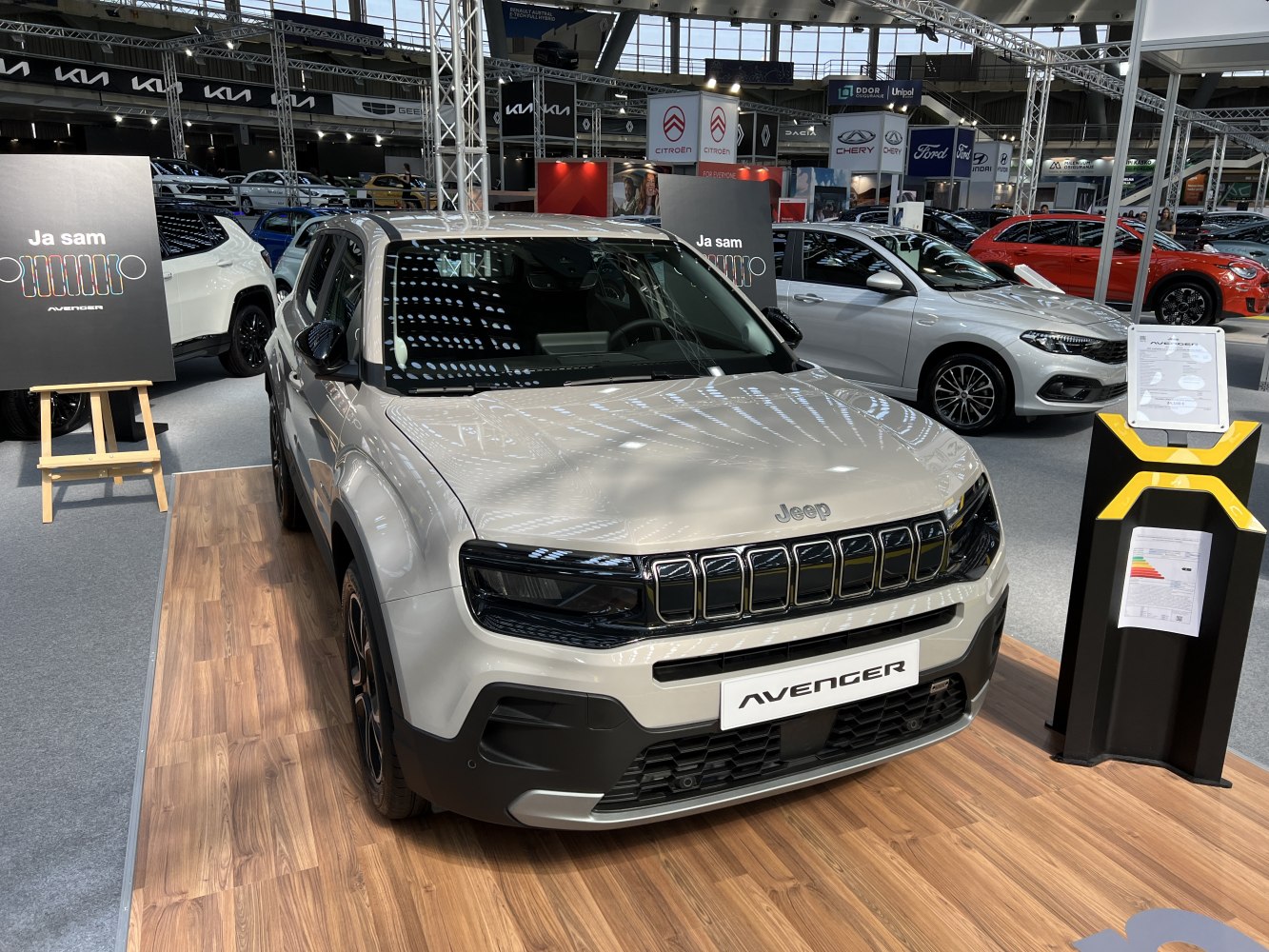 Front view of compact SUV with distinctive grill and sleek headlights