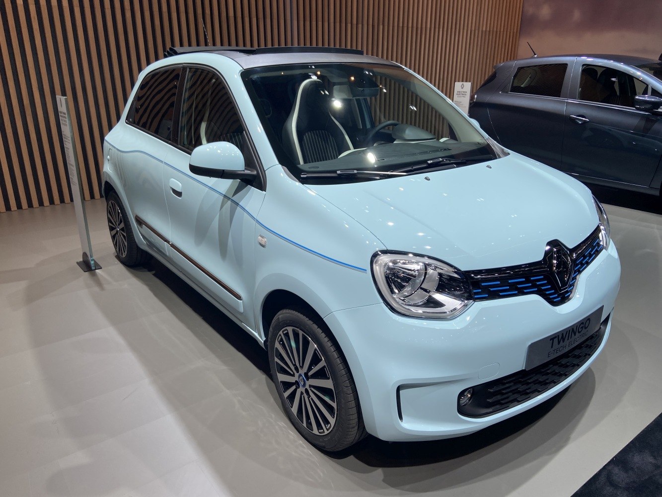 Compact electric hatchback with LED headlights and distinctive front grille