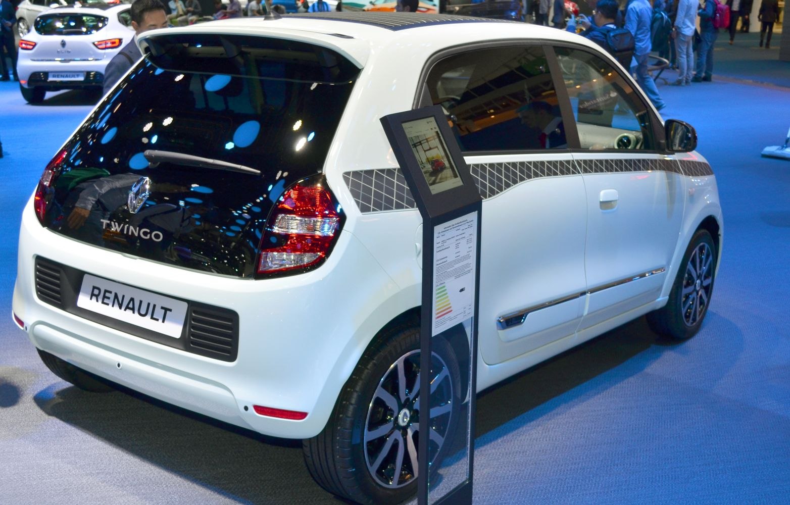 Rear and side view of compact hatchback with distinctive taillights and alloy wheels