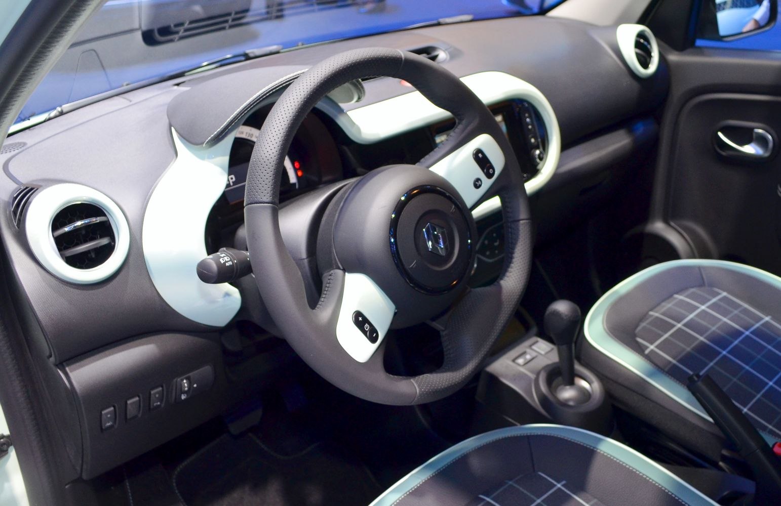 Renault Twingo III interior with dashboard, steering wheel, and seats