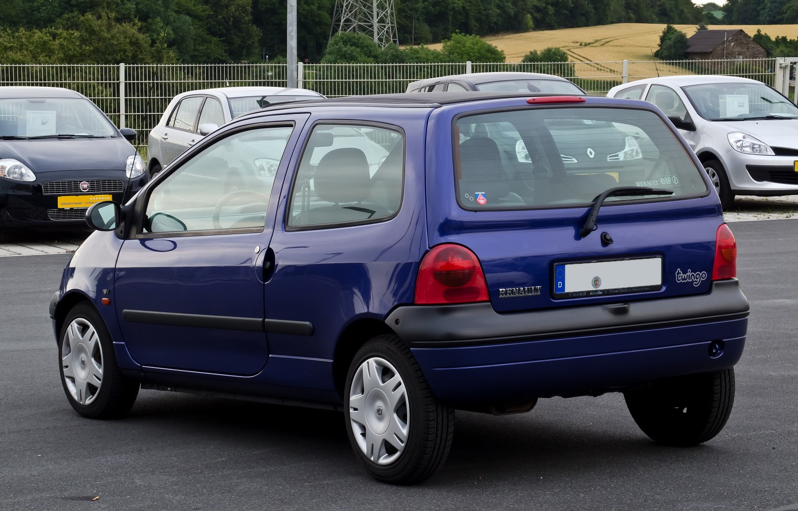 Compact three-door hatchback rear side view with rear window wiper