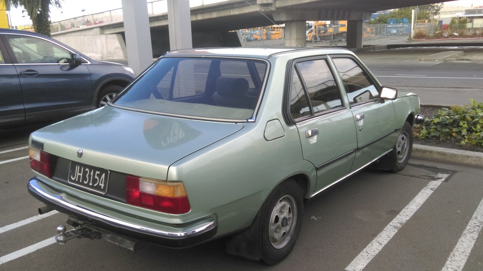 Rear view of classic 1978 vintage sedan with distinctive taillights and chrome bumper