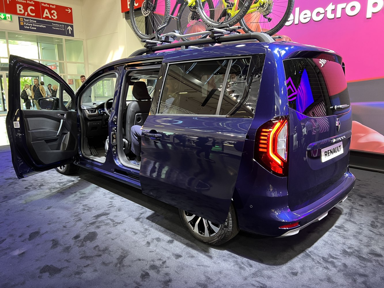Sliding rear doors and roof-mounted bike rack