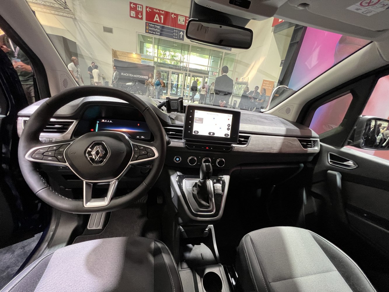 Digital dashboard and central touchscreen in car interior
