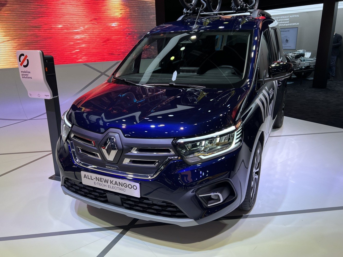 Front view of electric vehicle with charging station